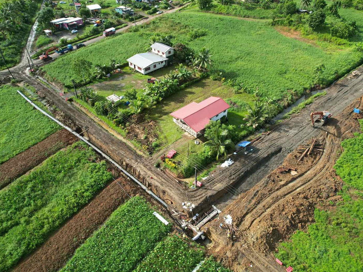 Aerial view of Waila project job site showing trench with pipeline in a rural setting.