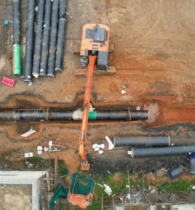 Aerial view of job site showing pipe in trench