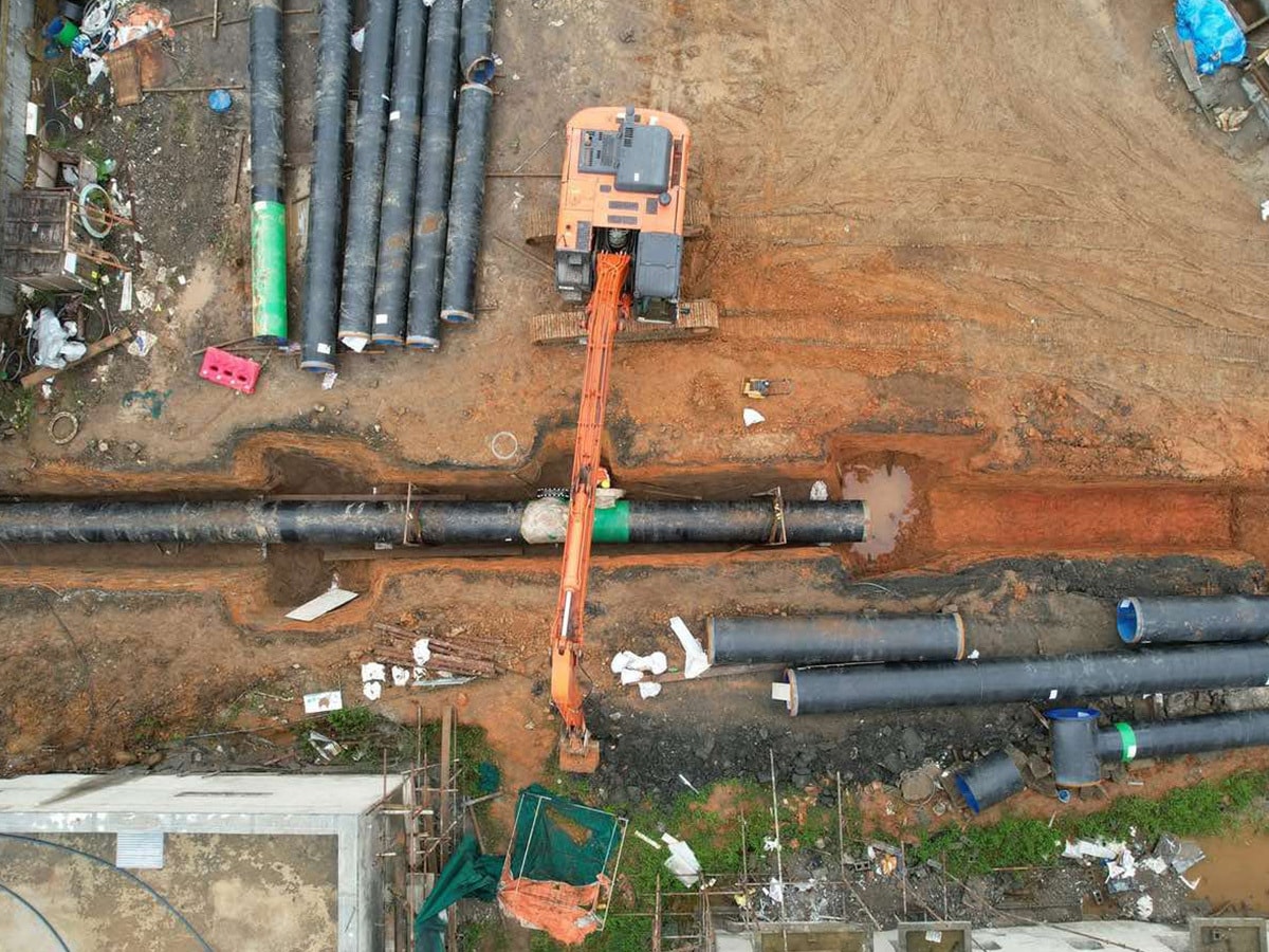 Aerial view of job site showing pipe in trench